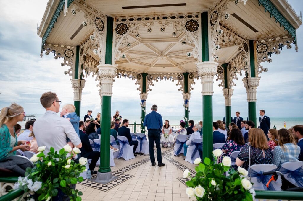 gorgeous day with sunny blue skies for couple to get married at the Brighton Bandstand